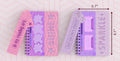 DIE CUT COVER JOURNAL W PEN STICKY PADS PURPLE SPIRAL JOURNAL