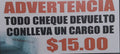 TODO CHEQUE DEVUELTO CONLLEVA CARGO DE $15.00 SIGN
